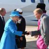 La reine Elizabeth II et le prince Philip ont atterri à l'aéroport George Best de Belfast où ils ont notamment été accueillis par la Secrétaire d'Etat d'Irlande du Nord, Theresa Villiers, le 23 juin 2014.