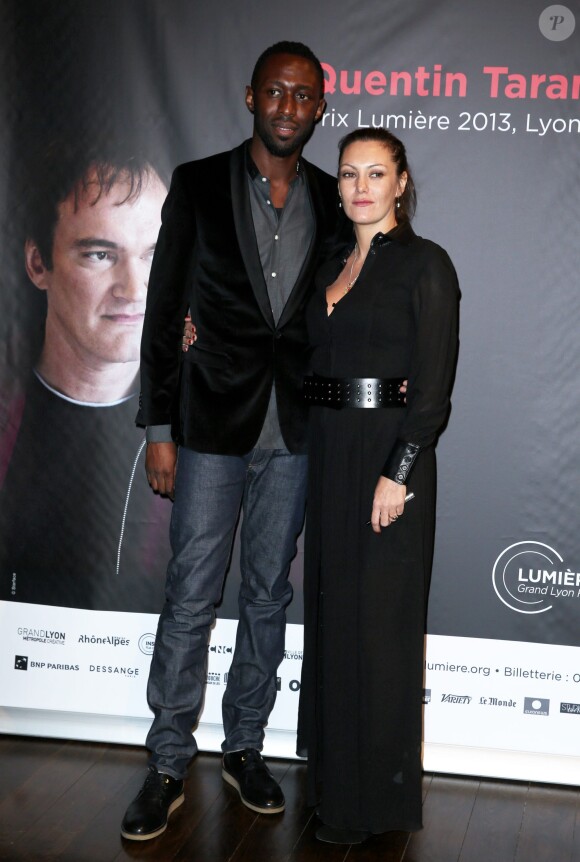 Thomas Ngijol et Karole Rocher enceinte - Remise du Prix Lumière 2013 à Quentin Tarantino à l'amphithéâtre du palais des Congrès de Lyon le 18 octobre 2013 