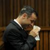 Oscar Pistorius, sur le banc des accusés du tribunal de Pretoria, le 18 mars 2014