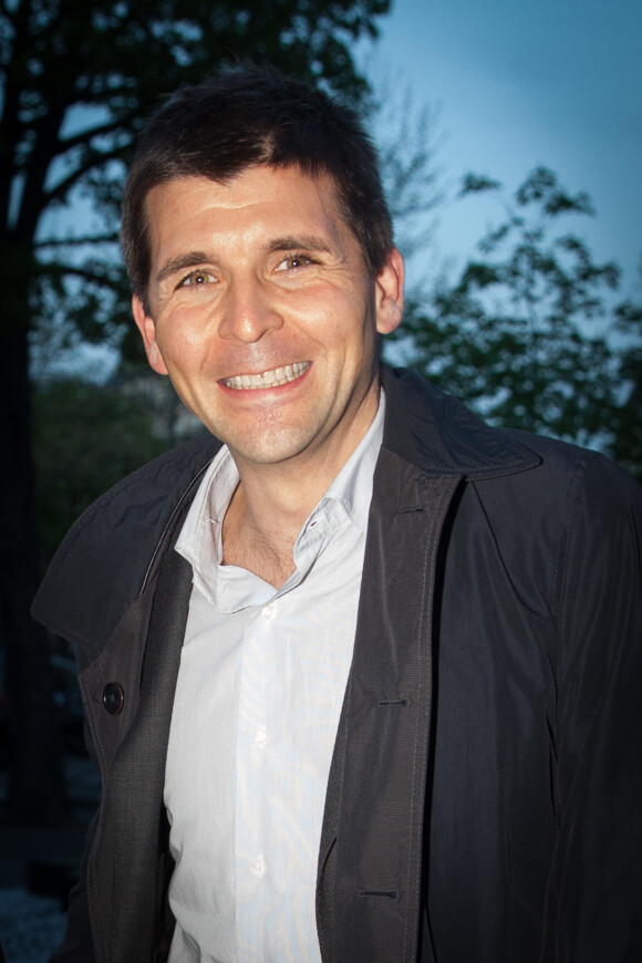 Thomas Sotto - Arrivées au dîner en l'honneur d'UNITAID au Conseil économique, social et environnemental à Paris, le 1er avril 2014.