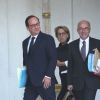 François Hollande, président de la république, Bernard Cazeneuve, ministre de l'Intérieur et Marylise Lebranchu, ministre de la Décentralisation, de la réforme de l'état et de la fonction publique lors de la sortie du conseil des ministres au palais de l'Elysée à Paris, le 2 juillet 2014.