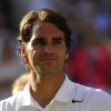 Roger Federer, en larmes après s'être incliné en finale de Wimbledon face à Novak Djokovic, le 6 juillet 2014, à Londres