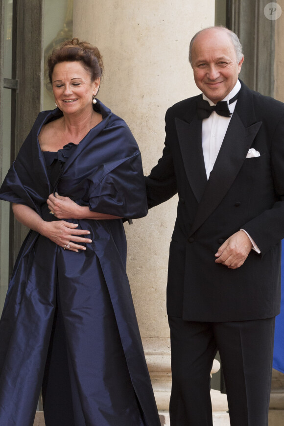 Laurent Fabius et sa compagne Marie-France Marchand-Baylet à l’Elysée à Paris, le 6 juin 2014