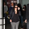 Kim Kardashian arrive à l'aéroport Roissy-Charles-de-Gaulle. Le 9 juillet 2014.