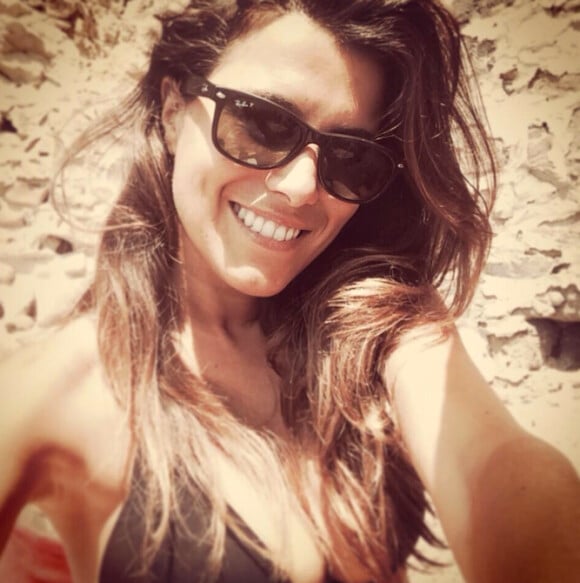 Karine Ferri très sexy lors de ses vacances en Corse. Juin/Juillet 2014.