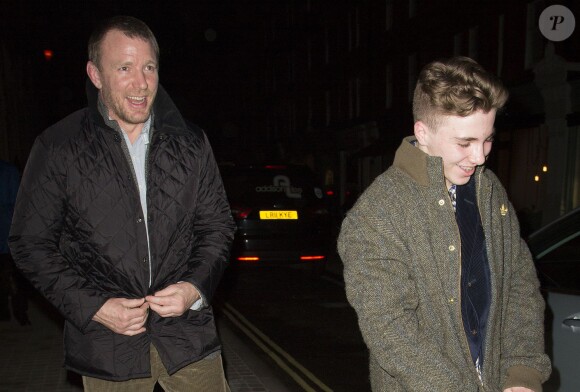 Guy Ritchie et son fils Rocco quittent la soirée Harvey Weinstein Pre-Bafta à Londres. Le 15 février 2014