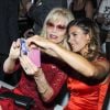 Amanda Lear et Elisabetta Canalis assistent au défilé Minx by Eva Lutz lors de la Fashion Week de Berlin. Le 9 juillet 2014.