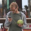 Exclusif - Andrea Casiraghi se désaltère avec de l'eau de coco aux abords de la plage d'Ipanema, à Rio de Janeiro le 11 juillet 2014, à quelques heures du dénouement de la Coupe du monde.