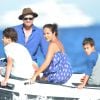 L'acteur australien Simon Baker avec sa femme Rebecca Rigg et leurs fils Claude Blue et Harry Friday profitent de leurs vacances sur un yacht à Saint-Tropez, le 11 juillet 2014.