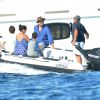 L'acteur australien Simon Baker avec sa femme Rebecca Rigg et leurs fils Claude Blue et Harry Friday profitent de leurs vacances sur un yacht à Saint-Tropez, le 11 juillet 2014.