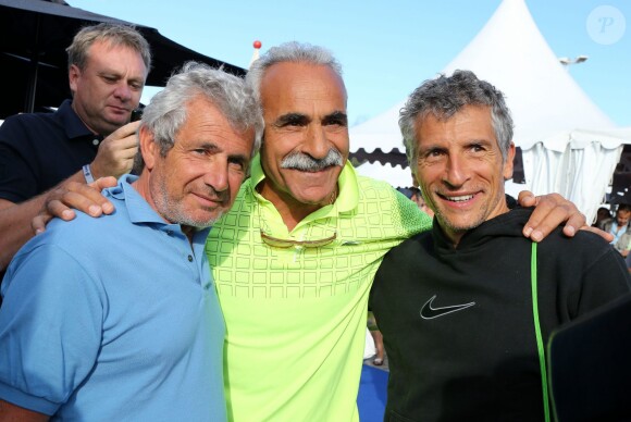 Michel Boujenah, Mansour Bahrami et Nagui lors de la 4ème édition du Classic Tennis Tour à Saint-Tropez, le 12 juillet 2014.