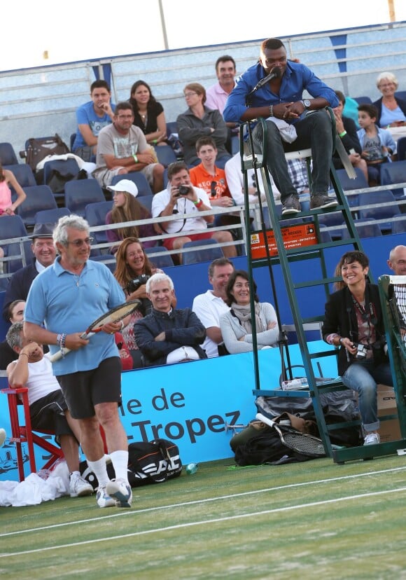 Michel Boujenah et Marcel Desailly lors de la 4ème édition du Classic Tennis Tour à Saint-Tropez, le 12 juillet 2014.
