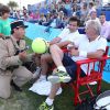Björn Borg, Fabrice Santoro et le gendarme de Saint-Tropez lors de la 4ème édition du Classic Tennis Tour à Saint-Tropez, le 12 juillet 2014.