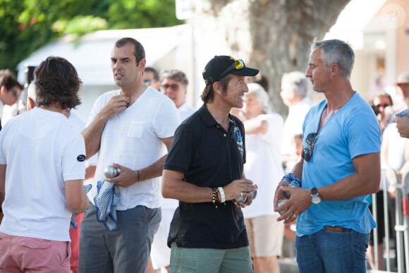 Cédric Pioline, Alexandre Debanne et David Ginola lors d'une partie de pétanque organisée en marge de la 4ème édition du Classic Tennis Tour à Saint-Tropez, le 11 juillet 2014.
