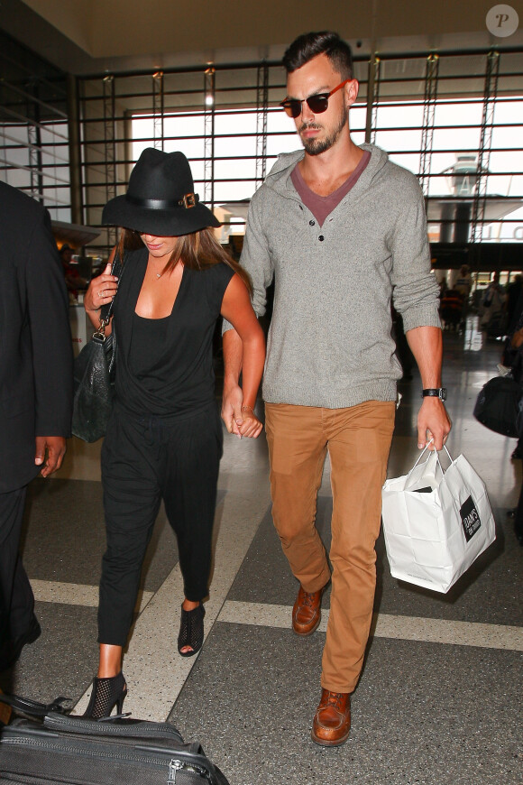Lea Michele n'hésite plus à s'afficher avec son boyfriend Matthew Paetz à l'aéroport de Los Angeles, le 15 juillet 2014.