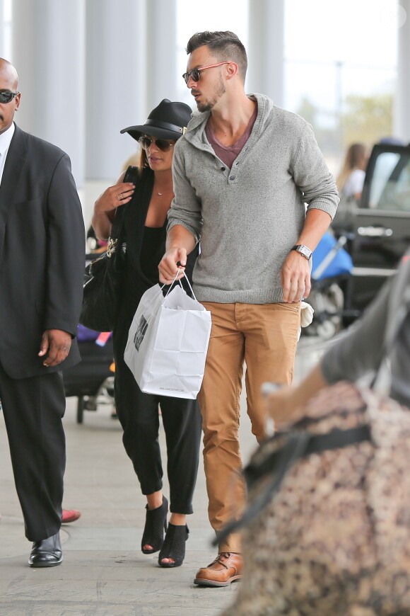 Lea Michele s'affiche avec son nouvel amoureux Matthew Paetz à l'aéroport de Los Angeles, le 15 juillet 2014.