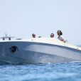 Vincent Lagaf' arrive sur une plage de Saint-Tropez avec son nouveau bateau de la marque "Cigarette", le 17 juillet 2014.