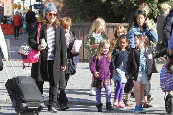 Mimi O'Donnell et ses enfants Cooper, Tallulah et Willa dans les rues de West Village à New York le 7 mai 2014