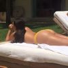 Kim Kardashian, topless au Mexique. Juillet 2014.