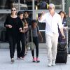 Brad Pitt and Angelina Jolie avec deux de leurs enfants aux Los Angeles International Airport le 14 juin 2014.