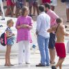 La reine Sofia d'Espagne accompagne sa petite-fille Irene Urdangarin, 9 ans, fille de l'infante Cristina, à son cours de voile à Palma de Majorque le 30 juillet 2014.