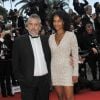 Luc Besson et sa femme Virginie Silla - Montée des marches du film " Saint-Laurent" lors du 67e Festival du film de Cannes le 17 mai 2014
