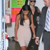 Kim Kardashian, habillée d'une robe Bec & Bridge et de sandales Prada, quitte le magasin Ulta Beauty après y avoir fêté le lancement du nouveau spray Kardashian Sun Kissed. Los Angeles, le 6 août 2014.