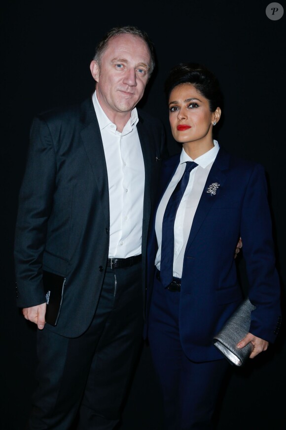 Francois-Henri Pinault et sa femme Salma Hayek au défilé Homme Saint Laurent Automne/Hiver 2014-2015 à Paris, le 19 janvier 2014