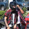 Le chanteur canadien Justin Bieber s'amuse à conduire des Can-Am Spyder (motos à trois roues) avec un ami à Los Angeles, le 21 août 2014.