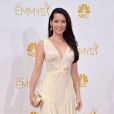 Lucy Liu assiste à la 66ème édition des Emmy Awards au Nokia Theatre, habillée d'une robe Zac Posen. Los Angeles, le 25 août 2014.