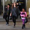 Angelina Jolie avec Maddox et Zahara à Los Angeles, le 29 mars 2014.