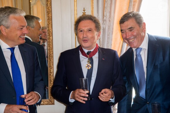 Didier Reynders, Michel Drucker et Eddy Merckx au palais d'Egmont à Bruxelles le 27 juin 2014