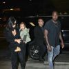 Kim Kardashian, Kanye West, et leur petite fille North à l'aéroport Lax de Los Angeles, le samedi 30 août 2014.