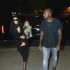 Kim Kardashian, Kanye West, accompagnés de leur petite North à l'aéroport Lax de Los Angeles, le samedi 30 août 2014.