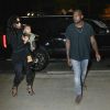 Kim Kardashian, Kanye West, et leur petite North à l'aéroport Lax de Los Angeles, le samedi 30 août 2014.