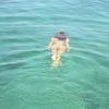 Baignade en mer pour la sexy Zahia Dehar, toujours en vacances. Septembre 2014.