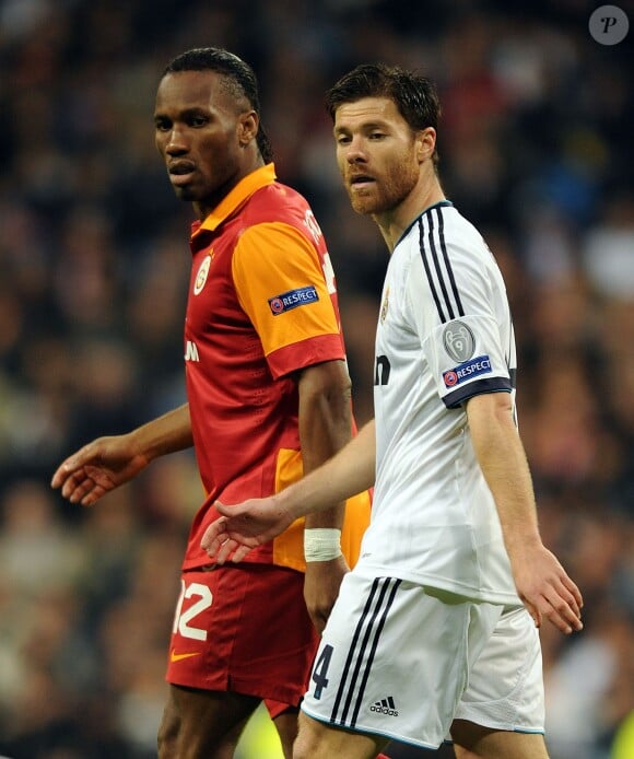 Didier Drogba et Xabi Alonso à Madrid le 3 avril 2013.