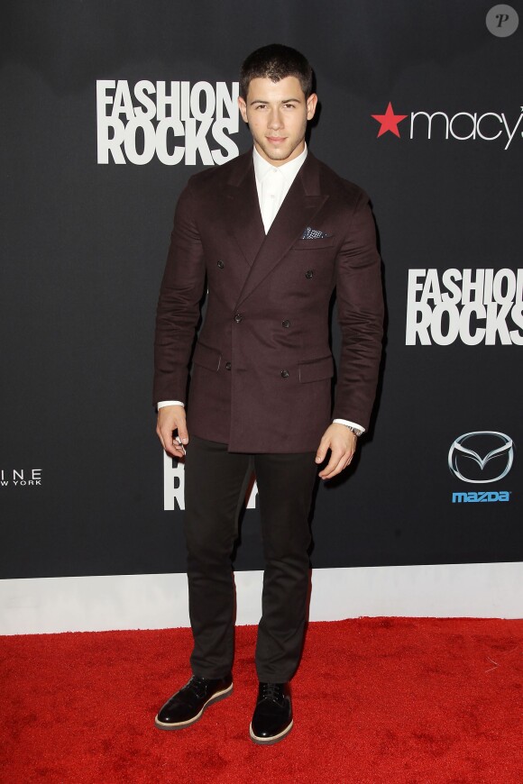 Nick Jonas assiste à la soirée-émission Fashion Rocks 2014 au Barclays Center. Brooklyn, New York, le 9 septembre 2014.