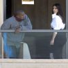 Kanye West et Kim Kardashian dans leur chambre d'hôtel à Sydney. Le 11 septembre 2014.
