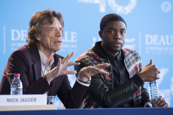 Mick Jagger et Chadwick Boseman - Conférence de presse du film "Get On Up" lors du 40ème festival du cinéma américain de Deauville, le 12 septembre 2014.