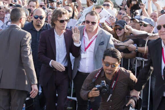 Le chanteur Mick Jagger - Photocall du film "Get On Up" lors du 40ème festival du cinéma américain de Deauville, le 12 septembre 2014.
