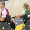 Zara Phillips et son mari Mike Tindall à la lutte lors de leur match exhibition de rugby en fauteuil roulant lors des Invictus Games, le 12 septembre 2014 à la Copperbox Arena, à Londres.
