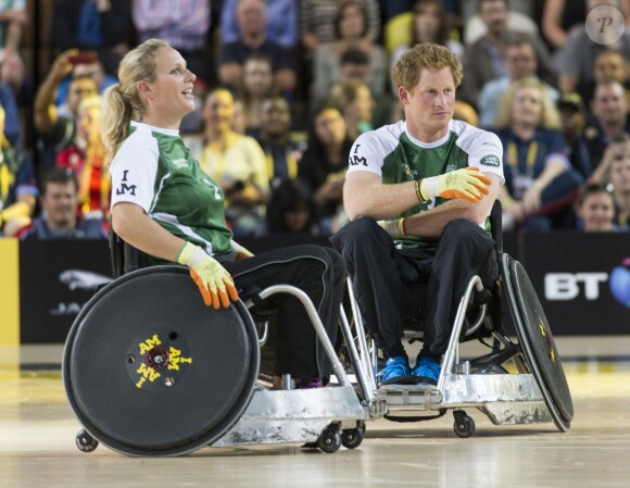 Le prince Harry et sa cousine Zara Phillips ont disputé un match exhibition de rugby en fauteuil roulant lors des Invictus Games, le 12 septembre 2014 à la Copperbox Arena, à Londres.