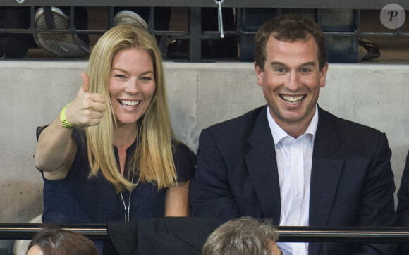 Peter et Autumn Phillips ont regardé avec plaisir le prince Harry, Zara Phillips et Mike Tindall lors de leur match exhibition de rugby en fauteuil roulant lors des Invictus Games, le 12 septembre 2014 à la Copperbox Arena, à Londres.