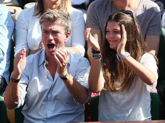 Philippe Caroit et sa fille Blanche lors de la demi-finale de la Coupe Davis entre la France et la République Tchèque le 13 septembre 2014 à Paris.