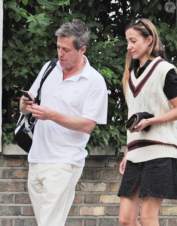 Exclusive - Hugh Grant et Anna Eberstein lors d'un match de criquet à Londres le 20 juin 2014