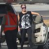 Semi-Exclusif - Jennifer Lopez sort d'un studio de danse puis se rend à l'aéroport de Los Angeles pour prendre un jet privé, le 15 septembre 2014.