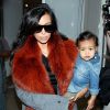 Kim Kardashian et sa fille North West arrivent à l'aéroport LAX et se rendent à Chicago. Los Angeles, le 22 septembre 2014.