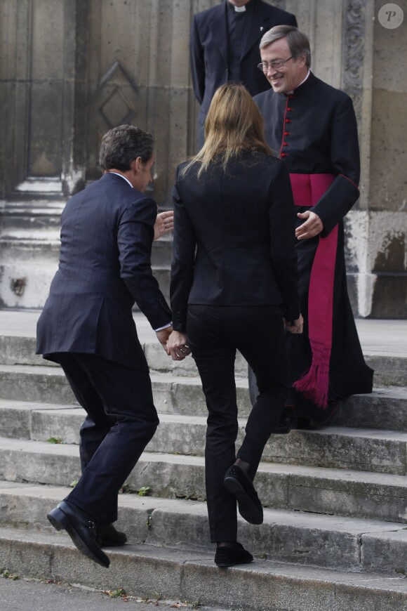 Nicolas Sarkozy et Carla Bruni-Sarkozy - Cérémonie en l'honneur de l'ancien préfet Christian Frémont, qui fut le directeur de cabinet de Nicolas Sarkozy à l'Elysée, en l'église Saint-François-Xavier à Paris, le 24 septembre 2014.