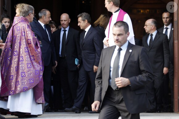 Nicolas Sarkozy et Bernard Cazeneuve - Cérémonie en l'honneur de l'ancien préfet Christian Frémont, qui fut le directeur de cabinet de Nicolas Sarkozy à l'Elysée, en l'église Saint-François-Xavier à Paris, le 24 septembre 2014.
